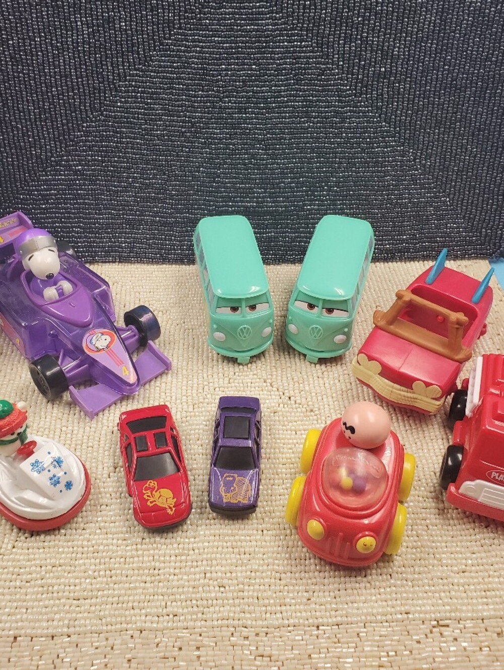 Collection of 9 vintage and fast-food promotional toy cars. (C25)